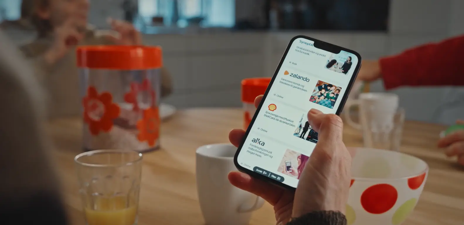 Mobil med PlusKort-app i case om digital kampagne